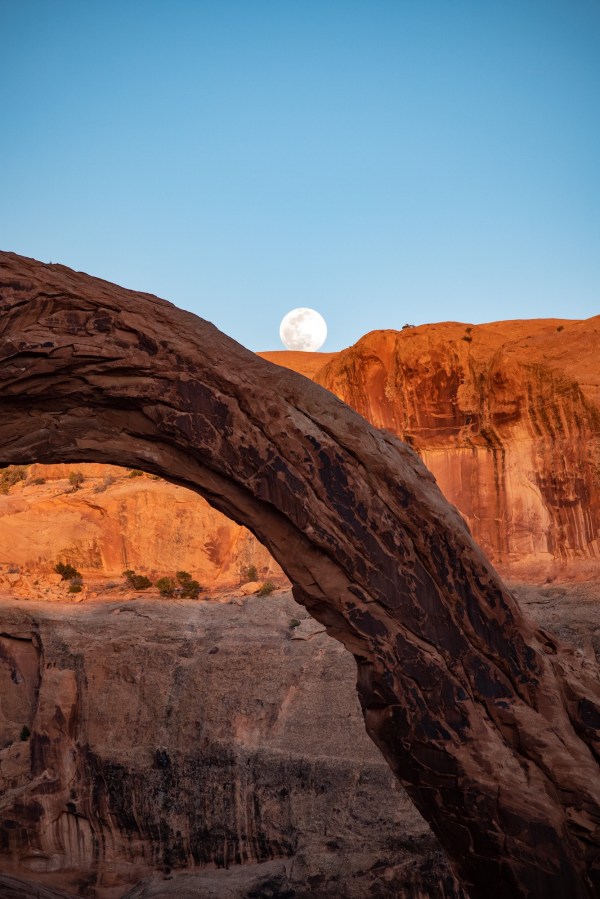 Full moon rising over Corona Arch, perfect timing.