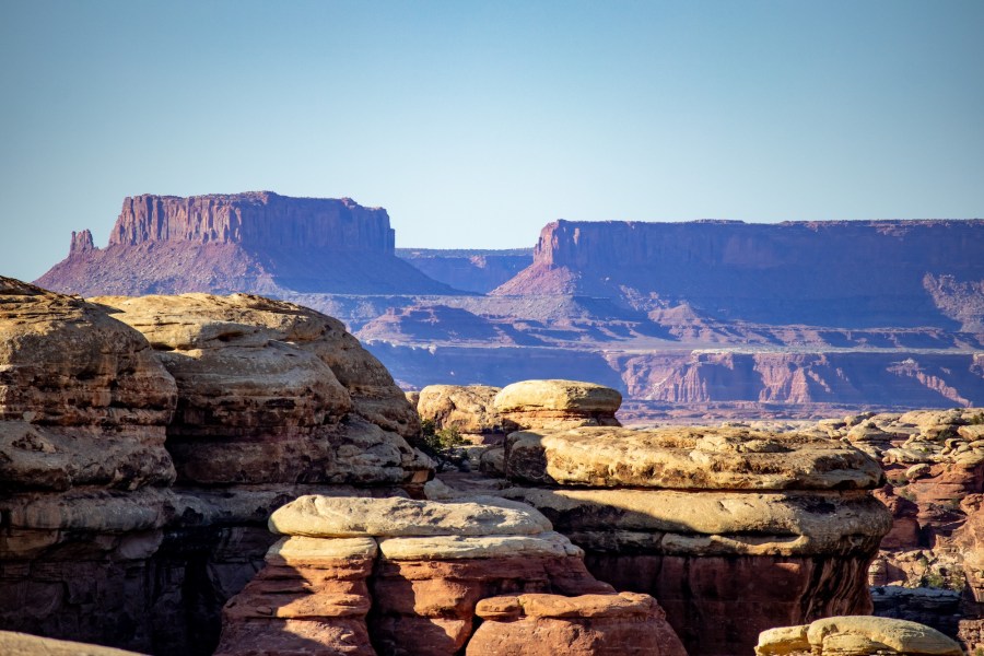 Grand View Point (R) and Junction Butte (L) at the tip of Island In The Sky viewed from the Needles.